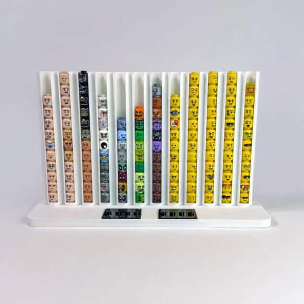 White LEGO minifigure head holder by FigFix, shown full of elements