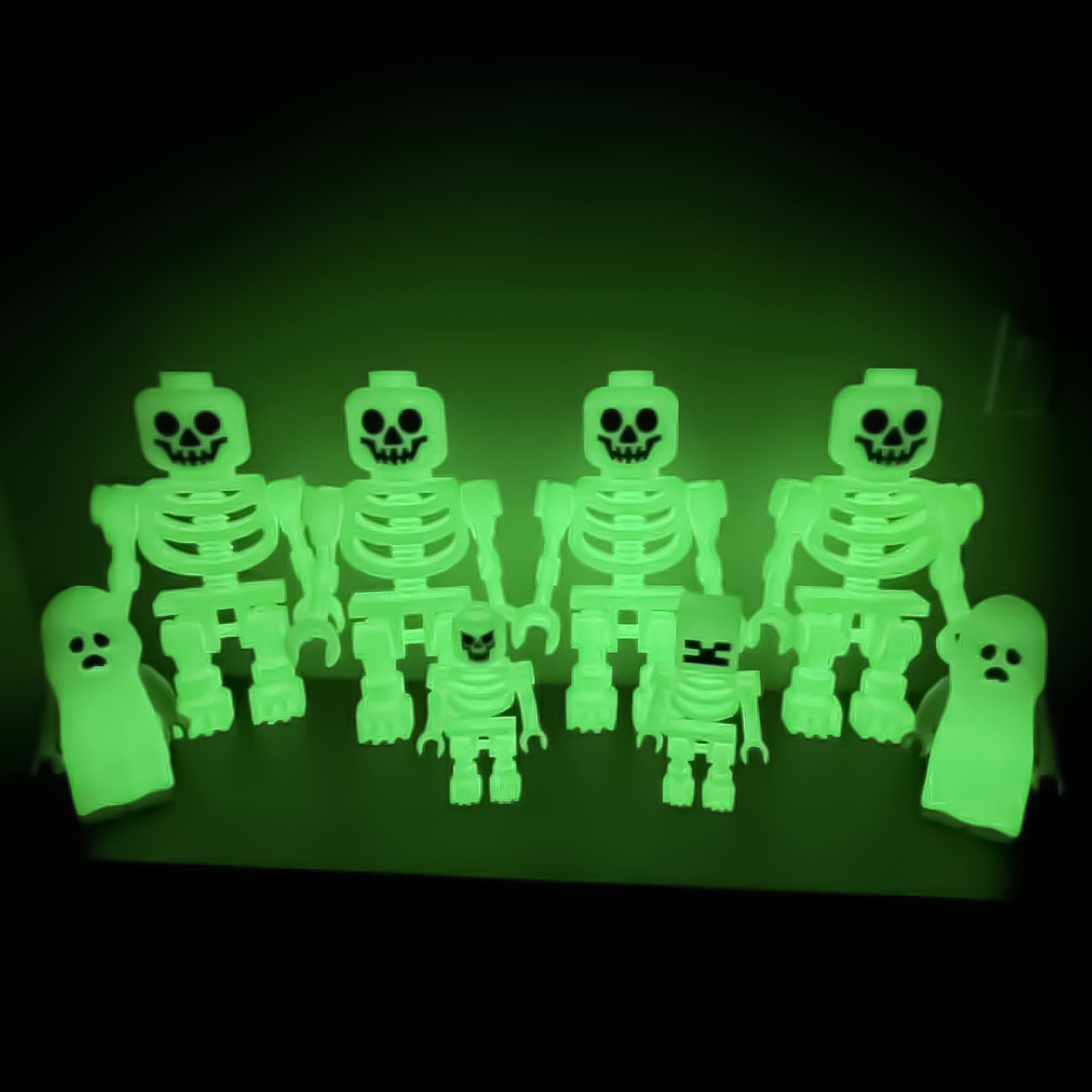 Comparison of 8-inch and 16-inch glowing 3D printed figures by Petite Brique