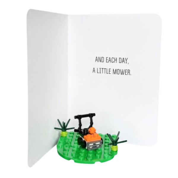 Interior of the mower all-occasion card showing message area with completed mini LEGO mower build